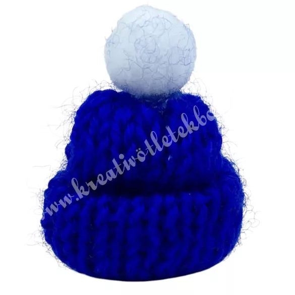 Mini kötött sötétkék sapka, fehér pomponnal, 3x4 cm